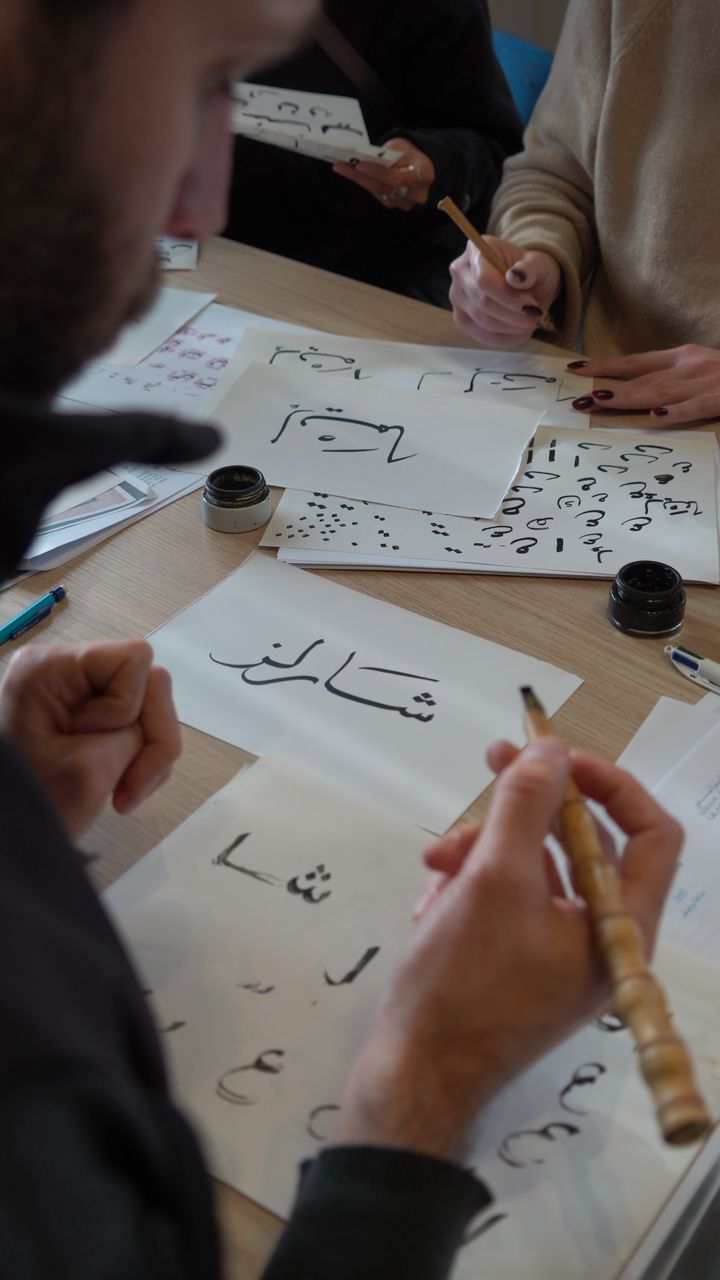 Arabic calligraphy with a reed pen