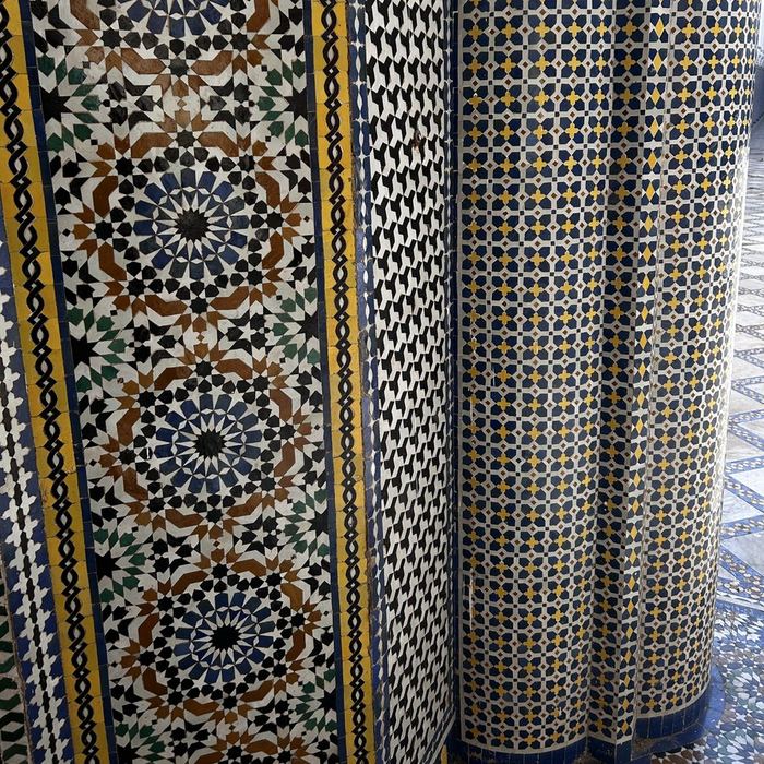 Close-up of handmade zellige mosaic tilework in Fez