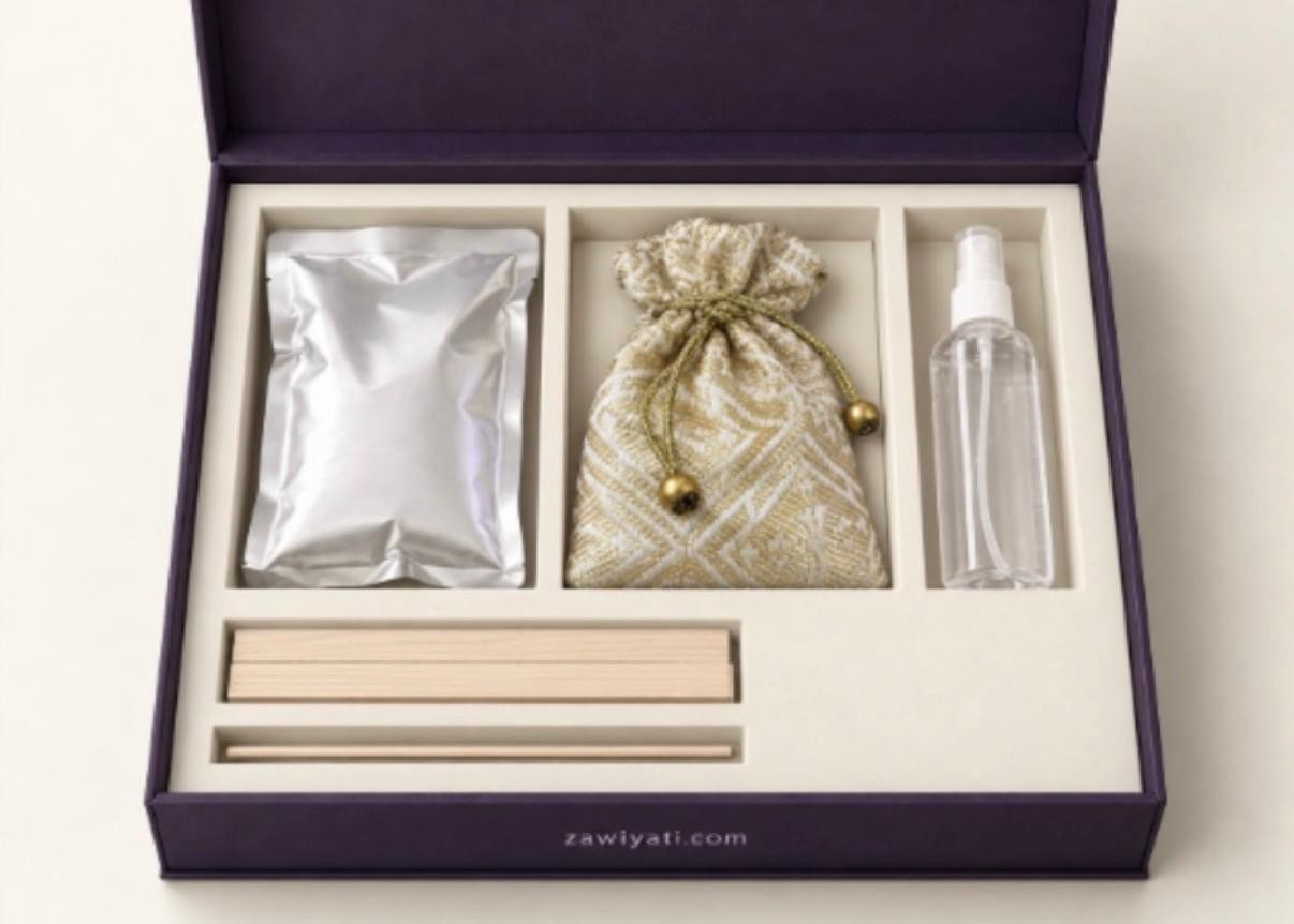 Open kit box showing the plaster pouch, tile pouch, spray bottle, wood dowels and stirring stick